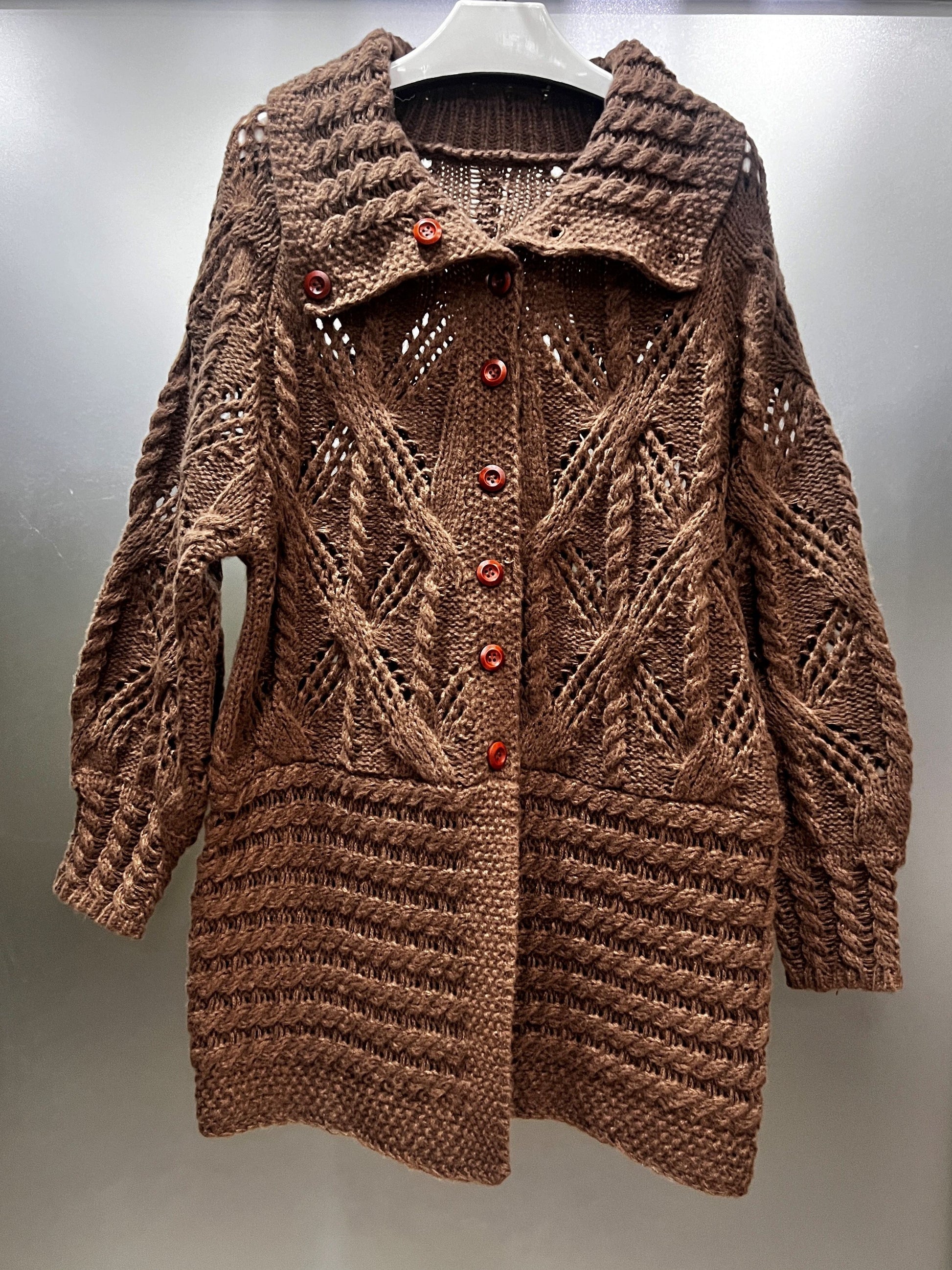 A Chunky Long Coat with a Twisted Rope Design