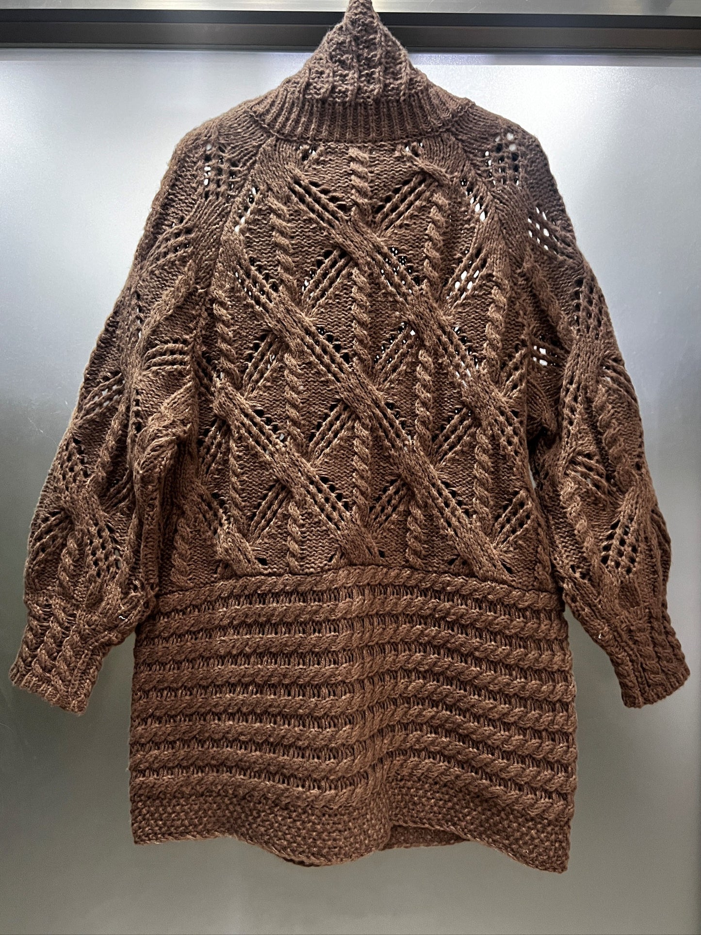 A Chunky Long Coat with a Twisted Rope Design