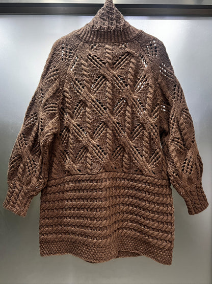 A Chunky Long Coat with a Twisted Rope Design