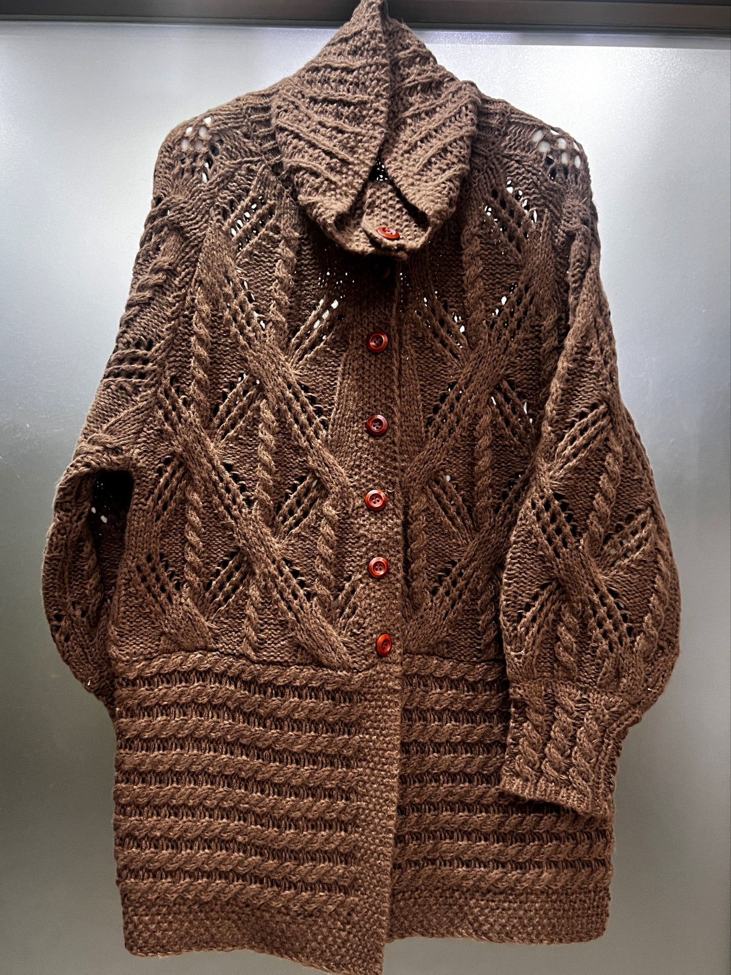 A Chunky Long Coat with a Twisted Rope Design