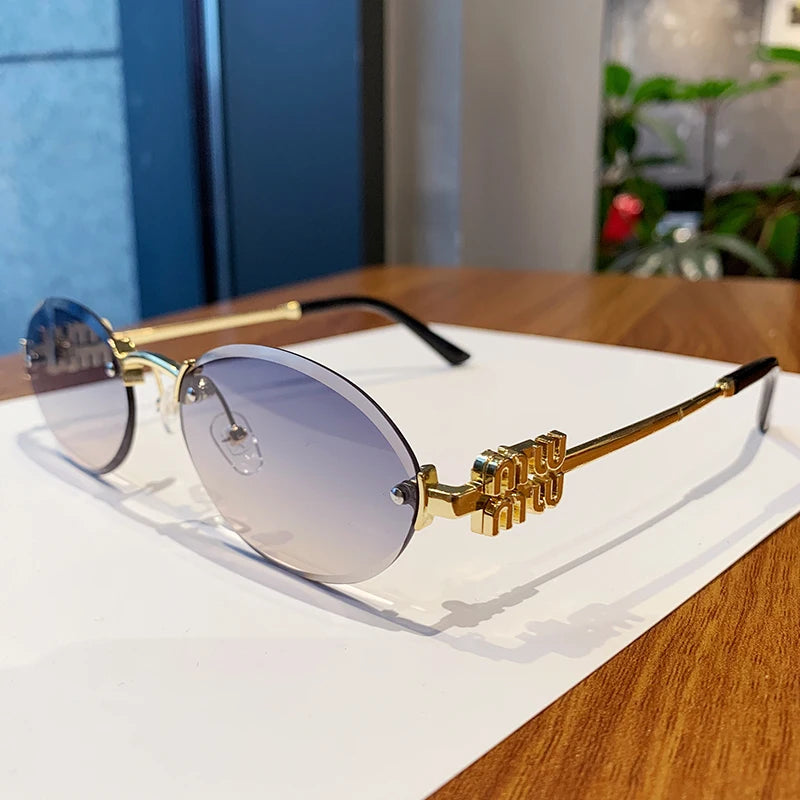 Oval Frame Sunglasses New Rimless Cut Edge Personality Glasses Fashion Design Sense Small Frame Sunglasses 90289