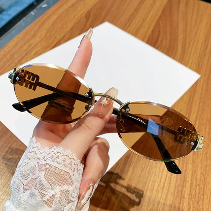 Oval Frame Sunglasses New Rimless Cut Edge Personality Glasses Fashion Design Sense Small Frame Sunglasses 90289