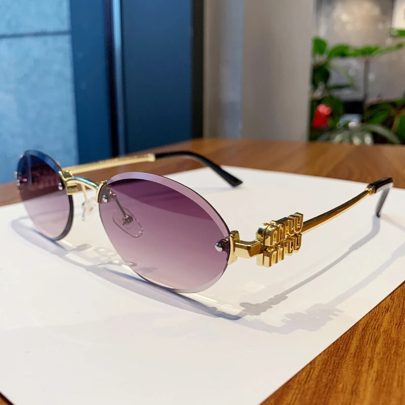 Oval Frame Sunglasses New Rimless Cut Edge Personality Glasses Fashion Design Sense Small Frame Sunglasses 90289