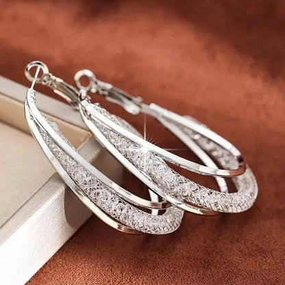 Elegant Crystal Hoop Earrings - Twisted Metal Design